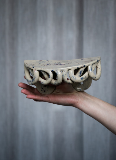 Shelf with spotted glaze detail