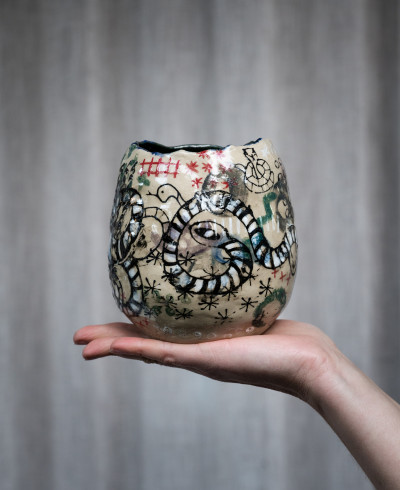 Vase with snake details