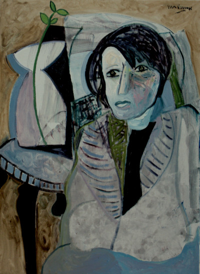 Woman at a table with vase